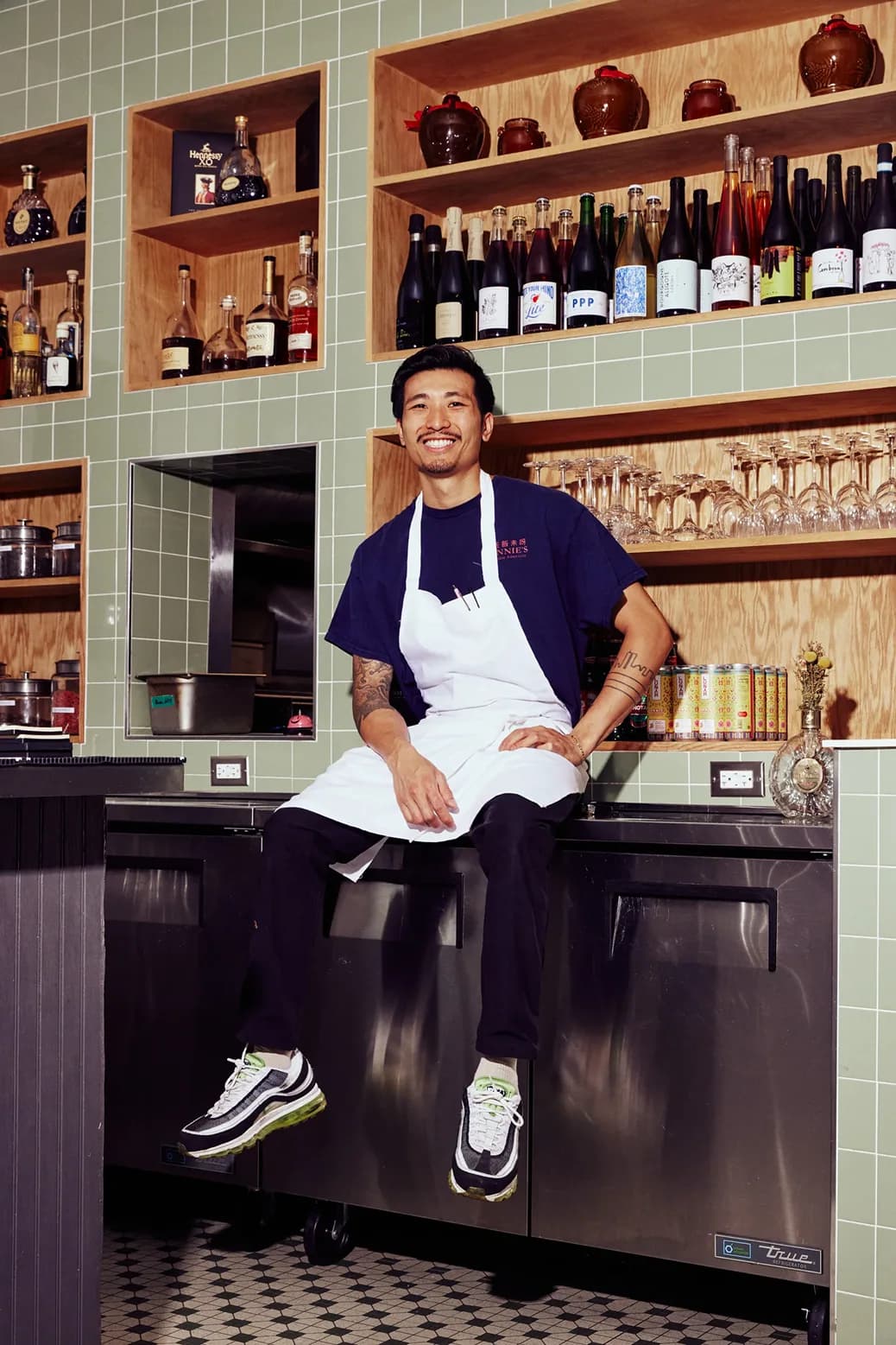 A hospitality operator behind the bar
