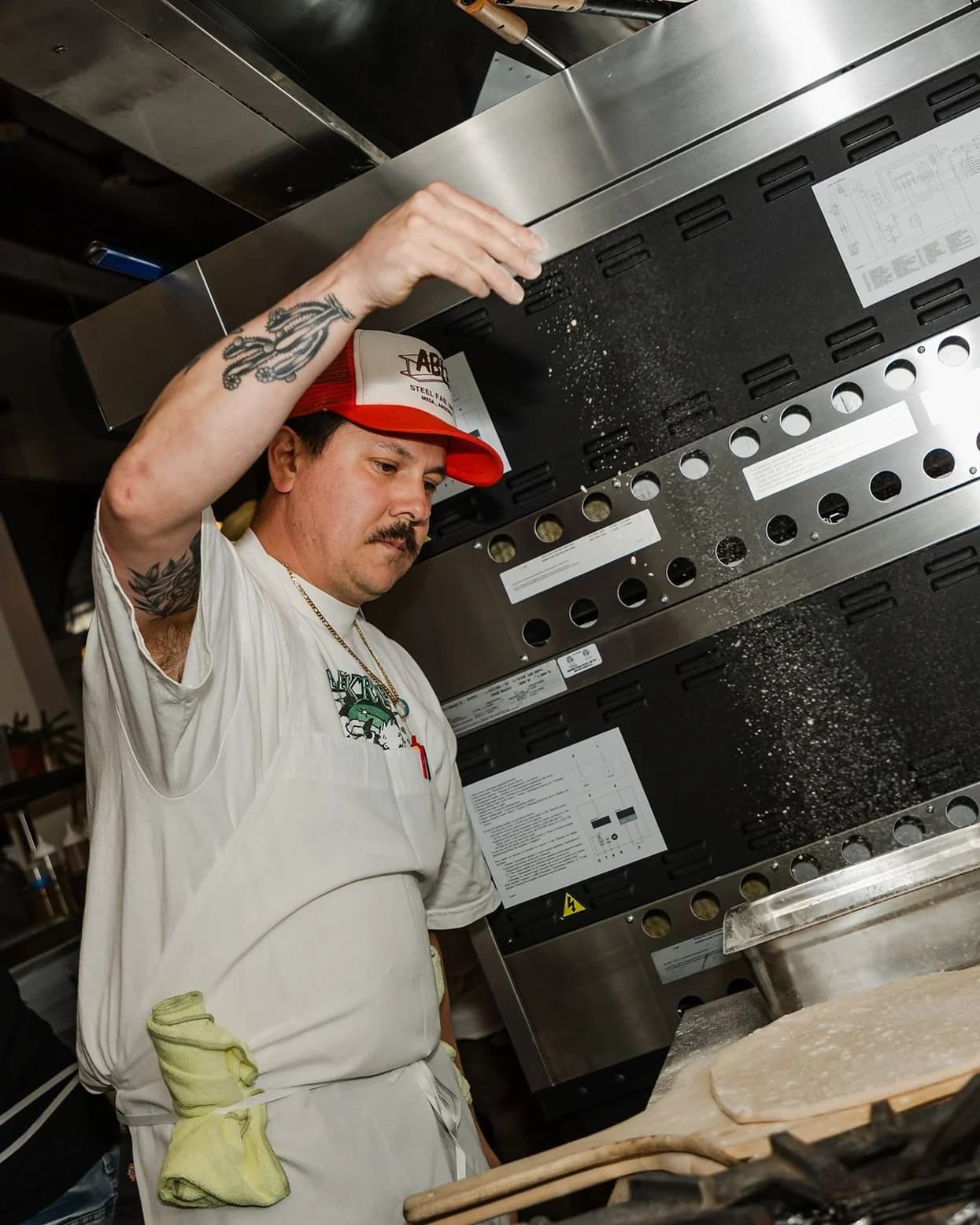 Chef preparing dough for service